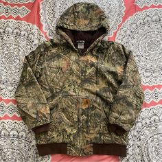 Euc. Small Marks. Youth Size Xl 18/20, Fits Like A Womens S. Carhartt Duck Insulated Jacket. Realtree Camouflage. “Heavyweight, 12-Ounce 100% Ring-Spun Washed Cotton Duck. Quilted Lining. Featherless Insulation For Warmth Without The Weight. Carhartt-Strong, Triple-Stitched Main Seams. Rib-Knit Waist And Storm Cuffs Help Keep Out The Cold. Attached Hood. Two Front Pockets. One Inner Pocket” C491 Firm Price Womens Carhartt Jacket, Carhartt Jacket Women's, Womens Hunting Clothes, Camo Jacket Women, Carhartt Womens Jacket, Vintage Camo Jacket, 2024 Clothes, Women Carhartt, Real Tree Camouflage