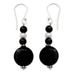 Illuminated by a single white pearl black onyx whispers of midnight kisses. These beautiful earrings are designed by India's Bhavesh. .925 Sterling silver Black Pearl Drop Party Jewelry, Black Pearl Drop Jewelry For Party, Black Pearl Drop Round Jewelry, Black Round Pearl Drop Jewelry, Black Pearl Drop Earrings For Party, Elegant Black Round Pearl Earrings, Black Sterling Silver Pearl Earrings For Formal Occasions, Black Pearl Drop Earrings For Formal Events, Black Pearl Drop Earrings For Evening