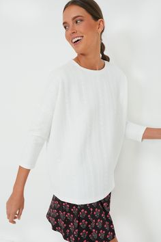 White Cable Ally Swing Sweatshirt Relaxed Fit Crew Neck Sweater For Daywear, Sporty White Top For Daywear, White Long Sleeve Sweater For Daywear, White Cotton Textured Knit Sweatshirt, White Crew Neck Sweater For Daywear, White Crew Neck Sweatshirt For Work, Casual Textured Knit Sweater For Daywear, Spring Textured Knit Sweatshirt With Relaxed Fit, White Relaxed Fit Sweatshirt For Work