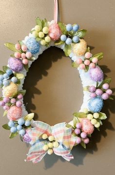 an easter wreath hanging on the wall