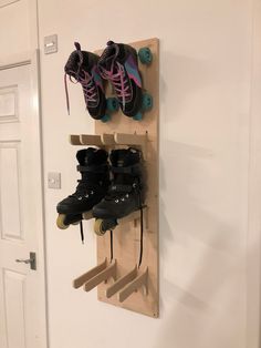 a pair of skates mounted to a wall