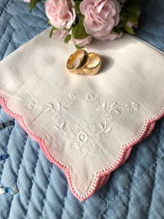 Delicate Embroidered Handkerchief, Floral Hankerchief, Hankie, Wedding Hanky With Crocheted Edge This hanky is a beautiful gift for your favorite bride! It would also make a great gift for a Mother if the Bride, Mother in Law to be or for those favorite bridesmaids of yours. They also make beautiful bouquet wraps. Condition: Excellent vintage condition, no frays, stains, holes or tears. Dimensions : 10 inches square Materials : Cotton Hem : Very Fine Red Scalloped Crochet Colors : White Motif : Elegant Pink Wedding Handkerchiefs, Elegant Machine Embroidered Handkerchiefs For Gifts, Traditional Handmade Handkerchiefs As Gifts, Vintage Embroidered Wedding Handkerchiefs, Vintage Embroidered Handkerchiefs For Wedding, Classic Embroidered Handkerchiefs For Wedding Gift, Vintage Floral Embroidery Wedding Handkerchiefs, Vintage Wedding Handkerchiefs With Machine Embroidery, Elegant Pink Handkerchiefs For Gifts