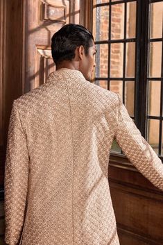 This set features all-over thread work highlighted with french knots and delicate sequin in a geometric pattern on a raw silk base. The ensemble is paired with a matching silk kurta and an afghani salwar.From Seema Gujral's A Royal Affair collection. DELIVERY TIMEPlease allow 8-12 weeks for your outfit to arrive. FABRIC DETAILSSherwani- Raw SilkKurta - SilkAfghani Salwar -Silk Professional cleaning only. Afghani Salwar, A Royal Affair, Open Image, Silk Kurta, French Knots, 12 Weeks, Thread Work, Professional Cleaning, Raw Silk