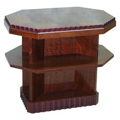 three tiered wooden display case with metal top and bottom section inlaid to each other