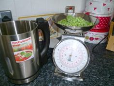 a kitchen counter topped with lots of different types of food and cooking utensils