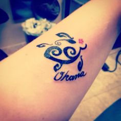 a woman's arm with a tattoo that says drama on it and an image of a flower