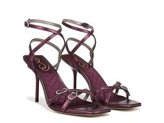 Sam Edelman Trevin - Women's Shoes : Metallic Orchid : Embrace the fusion of timeless glamor and modern flair wearing the Sam Edelman Trevin sandals. With their strappy, ankle-wrapped design, these square-toe sandals are going to be your favorite pick of all time. Leather upper. Synthetic lining with a padded footbed. Adjustable buckle closure on the slingback strap. Crisscross straps on the vamp with decorative buckles. Signature hardware on the heel tab. Sleek stiletto heel. Durable rubber out Purple Heels With Buckle Closure For Formal Occasion, Elegant Purple Sandals With Padded Heel, Elegant Purple Sandals With Buckle Closure, Elegant Purple Sandals With Branded Heel, Elegant Purple Sandals With Round Toe, Elegant Purple Synthetic Heels, Plum Heels, Plum Bridesmaid, Bridesmaids Heels