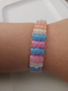 A multicolor ladder cuff handmade and handcrafted for small wrists havers that want a little pizzazz to go with their outfit! Labour Day, Jewelry Bracelets, Multi Color, Accessory Gift, Beaded Bracelets, Cuff, Electronic Accessories, Purses And Bags, Music Clothes