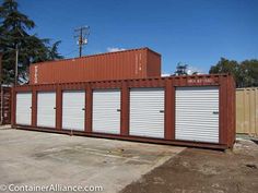 a large shipping container sitting in the middle of a parking lot