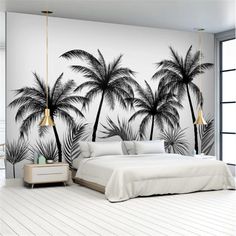 a bedroom with palm trees painted on the wall