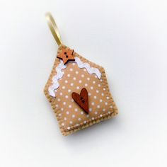 a ginger ornament hanging on a white background