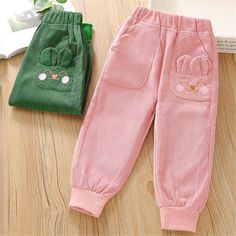 Cute Cotton School Bottoms, Cute Cotton Bottoms For School, Cute Pink Pants With Pockets, Cute Winter Cotton Pants, Cute Cotton Pants For Winter, Pink Cotton Pants For Playtime, Playful Pink Bottoms With Pockets, Cute Pants With Elastic Waistband For Playtime, Cotton Pants For Winter Playtime