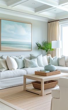 Freshly decorated coastal living room with serene beach-inspired color palette Interior Design Coastal Style, Beach Aesthetic Living Room Decor, Coastal Modern Living Room Home Decor, Beach Inspired Home Decor, Coastal Living Room Paint, Living Room Coastal Grandmother, Coastal Great Room And Kitchen, Beach Flat Decor, Coastal Beach Living Room