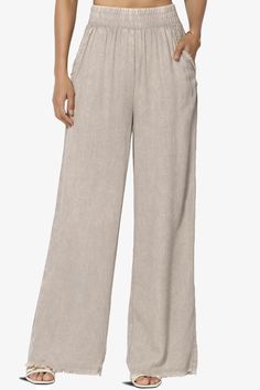 Discover the perfect blend of boho-chic and comfort with these Washed Linen Wide Leg Pants.Their elastic waistband and frayed hem offer a relaxed, yet stylish fit that moves with you.Crafted from a breathable linen blend, these versatile slacks are a must-have for effortless summer style.Dress them up for work or keep it casual for a weekend getaway. With slant pockets for convenience and a timeless wide-leg design, these full-length pants are ideal for every occasion.Trendy Wide Leg Pants: Capt Wide Leg Ankle-length Pants For Vacation, Chic Pull-on Beach Bottoms, Beige Relaxed Fit Wide Leg Pants With Pull-on Style, Relaxed Wide Leg Pants With Pull-on Style For Spring, Chic Beach Bottoms With Pull-on Style, Spring Beige Wide Leg Pants With Pull-on Style, Bohemian Relaxed Fit Bottoms For Day Out, Bohemian Bottoms With Relaxed Fit And Elastic Waistband, Fall Vacation Bottoms With Elastic Waistband