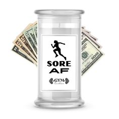 a glass jar filled with money and the words sore af on it's side