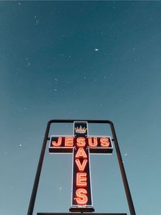 a neon sign that says jesus saves us