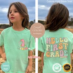 **Custom Hello First Grade Shirt, Personalized First Grader Tee,Back to School 1st Grade T-Shirt,Trendy Back To School Gifts For Third Grade** ✨Our designs are original creations✨ ✨We welcome any custom orders you may have. Please message us! ✨ Get your little one ready for the school year with our "In My First Grade Era" retro shirt, perfect for the first day of school. This stylish and comfortable tee is an ideal gift for kids, making their back-to-school outfit both fun and memorable. Made wi Cute Green Tops With Name Print, Cute Green T-shirt With Custom Print, Green Tops With Name Print For Summer, Green Short Sleeve Tops With Name Print, Green Summer Tops With Name Print, Green Short Sleeve Top With Name Print, Green Crew Neck Shirt With Name Print, 1st Grade Team Shirts, 1st Grade Class Shirts