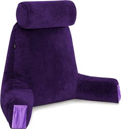 the purple reclining chair is made from plush material and has a built - in foot rest