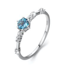 Inspired by the beauty of the universe, the dainty Center of the Universe Blue Topaz Ring reminds you of how precious you are, with an entire universe on your inside flowing with potentials, energy and with possibilities. This ring is made up of six equal-sized white topaz gemstones revolving like a galaxy around a more prominent blue topaz gemstone, made to sit at the center. A strikingly gorgeous piece to see you through the universe. ✦ Available in both 14K White Gold Vermeil (14k white gold Bff Rings, The Center Of The Universe, Center Of The Universe, Dainty Wedding Ring, Potential Energy, Topaz Engagement Ring, London Blue Topaz Ring, Ring White Gold, Shop Engagement Rings