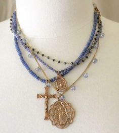 Andrea Barnett 4 Strand Beaded Necklace with Pendants /Crucifix, Madonna & Child | eBay Beaded Crucifix Necklace, Spiritual Crucifix Jewelry With Faceted Beads, Beaded Cross Pendant For Jewelry Making, Blue Bohemian Necklace With Cross Pendant, Bohemian Blue Cross Pendant Necklace, Blue Crucifix Necklace For Spiritual Wear, Blue Crucifix Necklace For Spiritual Purposes, Handmade Blue Crucifix Jewelry, Cross-shaped Faceted Beads For Jewelry Making