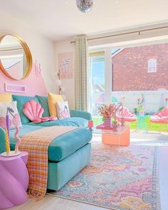 the living room is decorated in pastel colors