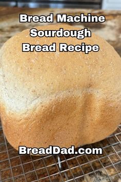 a loaf of bread sitting on top of a cooling rack