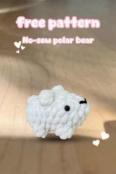 a sheep made out of yarn sitting on top of a wooden table with the words free pattern no - sew polar bear