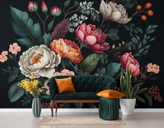 a living room with flowers painted on the wall