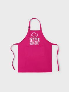 a pink apron with the words little sous chef printed on it and an image of a cloud