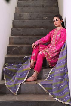 Channeling the old world charm of a kalidar kurta paired with shalwar, Serina is a striking hot pink number cut from pure rawsilk. The undulating trail of the geometric lime green and lavender contrasting organza dupatta hones in the ethereal aura. Model height: 5'3 Length: 38" Cut: relaxed fit In this price range, the Green And Lavender, Organza Shirt, Organza Dupatta, Silk Dupatta, Price Range, Silk Organza, Old World Charm, Raw Silk, Model Height