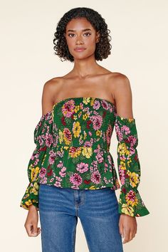 Autumn is in full bloom in the Everly Floral Off the Shoulder Smocked Peplum Top. Perfect for warmer autumn days, this top features a smocked bodice with a peplum waist. Smocked off the shoulder sleeves are attached. Complete the look with light wide leg pants and strappy heels for a flirty look.- Smocked bodice- Off the shoulder- Smocked sleeves- Peplum- Color: Green MultiSize + Fit - Model is 5'9" and wearing size XS- Measurements taken from size S - Chest: 29"- Length: 31 1/2" fabricSelf: 100 Off The Shoulder Sleeves, Autumn Days, In Full Bloom, Warm Autumn, Autumn Day, Strappy Heels, Shoulder Sleeve, Off Shoulder Blouse, Leg Pants