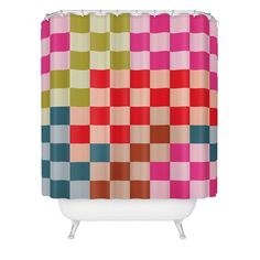 a colorful shower curtain with squares on it