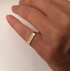 "Pinky ring, Engraved ring, Foreign Language, Initial Ring, Personalized Ring, Stacking Ring, name ring The ring made of Best quality 18k Gold Plate over sterling silver or syerling silver Engraved letter/s, word, name in any language Choose your size , and your word / name - in any language let me know in the \"note to seller\" during checkout what you want. The product will arrive to you packed in gift box and padded envelope to maintain the product Our jewelry are water resistant and comes wi Simple Gold Engraved Ring For Anniversary, Personalized Nameplate Ring For Promise, Personalized Engraved Nameplate Ring For Promise, Personalized Nameplate Promise Ring, Custom Nameplate Rings For Promise, Promise Ring With Custom Nameplate, Custom Nameplate Ring For Promise, Custom Name Nameplate Ring For Promise, Engraved Nameplate Ring For Promise