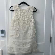 Excellent Condition, Only Wore Once As My Change Into Dress For My Wedding. Perfect For Anything Bridal! Has Elegant String Ties In The Back With Floral Appliqus. Size 2. Purchased At Neiman Marcus. A-line Lace Dress With Floral Embroidery For Wedding, Elegant Scalloped Lace Mini Dress For Wedding, Chic Floral Embroidered Mini Dress For Wedding, Chic Floral Embroidery Mini Dress For Wedding, Embellished Fitted Dress For Ceremony, Fitted Embellished Dresses For Ceremony, White Sleeveless Dress For Ceremony, Ceremony Fitted Embellished Dress, Elegant White Mini Dress With Lace Work