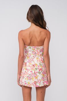 PRE-ORDER SHIPS ON OR AFTER 5/13/24 STYLE INFORMATION: You're a summer dream in the A Pop of Floral Strapless Mini Dress! White, red, pink, yellow, and green floral print forms a strapless neckline, ruched bust, and corset waist. Attached shorts underneath. Lined. DETAILS & CARE: Rayon, Lining: Polyester. Hand wash cold or dry clean. Imported. SHIPPING: Orders are processed within 1-2 business days. Packages are shipped out Monday-Friday, holidays are excluded. Strapless Floral Mini Dress, Summer Dresses Strapless, Floral Formal Dress Short, Floral Homecoming Dress, Floral Strapless Dress, Strapless Dress Mini, Floral Birthday Outfit, Floral Hoco Dresses, Hoco Dresses Floral