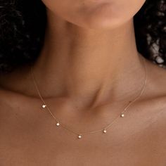 This stunning necklace features five bezel-set diamonds on a 14k gold chain. Versatile and elegant, this necklace dresses up any look and makes a wonderful gift.


5 lab grown diamonds, each with a width of 2mm

0.15 total carat weight

Bezel setting

Necklace has an adjustable length and can be worn at 16", 17" and 18" Small Diamond Necklace, Delicate Diamond Necklace, Diamond Necklace Simple, Minimalist Necklace Silver, Pretty Jewelry Necklaces, Product Shots, Necklace Dress, Circle Diamond, Bezel Set Diamond