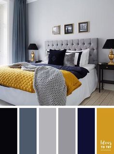 a bedroom with blue and yellow colors on the walls, white bedding, gray headboard