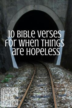 train tracks going into a tunnel with the words 10 bible verses for when things are homeless