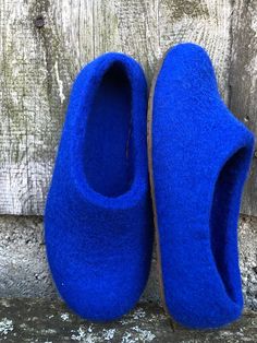 If You looking for warm shoes at home, these felt slippers with latex or rubber soles can be Your choice. Blue wool felt slippers for woman are the desired and needed shoes at home because they are comfy, cozy, warm, flexible, lightweight. Your feet will thank you at the moment when you put the slippers on.     The felted wool slippers are made using warm water, dyed wool and soap, and, of course , felted by my hands. The felted slippers are handmade and are made without seams.   The soles can b Felted Wool Slippers, Wool Clogs, Felt Slippers, Winter Ornaments, Felt Shoes, Felted Slippers, Warm Shoes, Wool Slippers, Felt Brooch