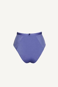 A high-waisted bikini bottom in a striking amethyst hue. It features a flattering cut that accentuates the waist and elongates the legs. The design includes a decorative gold-tone seashell buckle at the front, adding a touch of elegance and sophistication. The fabric is smooth with a slight sheen, ensuring a comfortable and stylish fit. This piece combines vintage-inspired charm with modern aesthetics, making it a perfect choice for a chic and polished beach or poolside look. We use only italian Summer Brief Bottoms Partially Lined, Purple Beachwear Bottoms For Pool, Purple Short Bottoms For Party, Purple Party Bottoms Short Length, Elegant Purple Brief Bottoms, Purple Short Length Bottoms For Party, Modern High-cut Leg Summer Bottoms, Modern High-cut Leg Bottoms For Summer, Chic High Waist Purple Bottoms