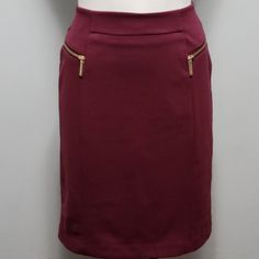 Crafted From A Ponte Knit This Skirt Is An Effortless Wardrobe Staple. A Rich Burgundy Tone Pencil Skirt With Goldtone Zippered Accents. Size 8 70% Polyester / 25% Viscose / 5% Elastane Workwear Stretch Skirt With Side Zipper, Workwear Skirt With Side Zipper And Stretch, Stretch Skirt With Side Zipper For Work, Stretch Skirt With Side Zipper, Chic Burgundy Skirt For Work, Fitted Burgundy Skirt For Work, Red Knee-length Pencil Skirt For Spring, Fitted Burgundy Lined Mini Skirt, Fitted Lined Burgundy Mini Skirt