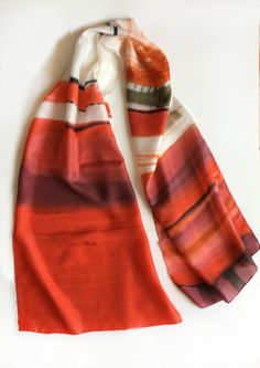 "Silk Scarf- Carmine Stripes/ Hand painted silk scarf, Abstract scarf painted, Red maroon long scarf, Silk Painting, Handmade scarf gift her, Christmas gift for her. Birthday gift for mom/ Art to wear/ ►measurements- 17\"x71\" ☺Striped Scarf is painted on pure silk pongee 8, luxuries silk fabric. ►SHIP NEXT DAY See my luxury scarves and shawls here: https://www.etsy.com/shop/klaradar?ref=l2-shopheader-name§ion_id=18979710 Felted scarves: https://www.etsy.com/shop/klaradar?ref=l2-shopheader-name& Artistic Hand Painted Red Silk Scarf, Abstract Scarf, Handmade Scarf, Striped Scarf, Luxury Scarves, Hand Painted Silk Scarf, Silk Art, Scarf Silk, Mom Art