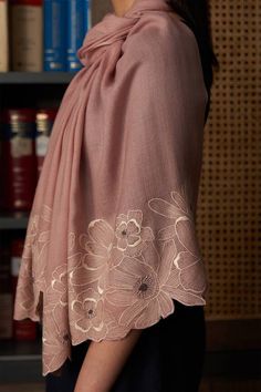 Pale mauve stole with magnolia bloom embroidered motifs and cutwork border. Type: Embroidered Composition: 70% Wool 30% Silk Color: Pink Other Details:  Handcrafted Size L X B (in cm) : 70 x 200 Weight: 250 gms Note: Inner top and pant worn by the model is not for sale  - Aza Fashions Stoles And Scarves, Pink Embroidered Dress, Cutwork Dress, Indian Designer Suits, Sleeves Designs For Dresses, Neckline Designs, Simple Embroidery