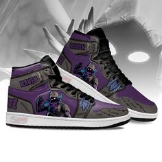 a pair of purple and black shoes with an image of a demon on the side