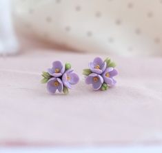 Delicate earrings - flower jewelry - purple earrings - cute stud earrings Details: * Small studs are ready to ship. * Each earring has nearly round shape and has in diameter 1 cm. * You will get your delicate violet flower polymer clay earrings with the direction how to use it correctly and the accessory will give you pleasure for a long time. Please note: * Check dimensions carefully because items may appear larger or smaller on the photos. * Real color may slightly differ from those in the pic Delicate Purple Flower Earrings For Gift, Delicate Purple Flower Earrings As Gift, Purple Flower-shaped Polymer Clay Earrings, Delicate Purple Flower Earrings, Purple 3d Flower Earrings For Gift, Purple Flower Polymer Clay Earrings, Flower Polymer Clay Earrings, Flower Polymer Clay, Jewelry Ceramic