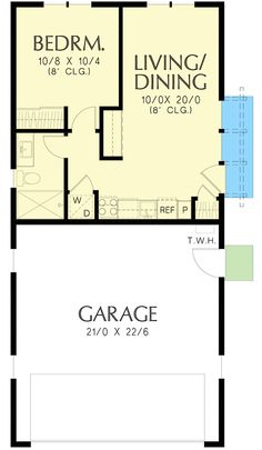 the floor plan for a two story house with garage and living room, including an attached bedroom