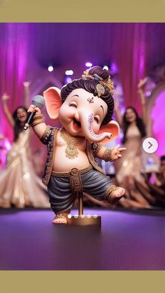 an elephant figurine is standing on a table