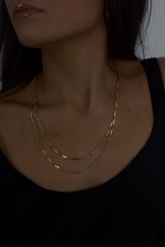 The Lex necklace, crafted with double draped 14K Gold-filled bar chain, is recognized for its brilliant layers and single clasp feature. The elongated flat bars reflect on the skin, creating a subtle yet lustrous glow. The luxurious detailing is enough to stand alone, or accompany any pieces from the Hydez Essential Collection.Material: 14K Gold-filledDimensions: 20 to 21 inches adjustable, 2mm chain width What is 14K Gold-filled? A thick gold layer (100 times more gold than gold plating) is bon Minimalist Double Strand Layered Chain Necklace, Formal Double Strand Chain Necklace, Minimalist 14k Gold Double Chain Necklace, Elegant Everyday Layered Figaro Chain Necklace, Elegant Layered Chain Necklace For Everyday, Elegant Everyday Layered Chain Necklace, 14k Gold Double Strand Chain Necklace, Elegant Chain Necklace With Rectangular Links For Layering, Elegant Double Chain Link Layered Necklace