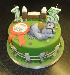 a green birthday cake with a horse on it