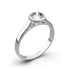 a white gold engagement ring with a round diamond